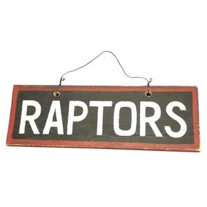 Raptors Wooden Sign by Settler’s Cabin